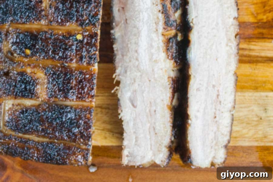 Step up your grill game by serving up some deliciously rendered down smoked pork belly. It's so rich and decadent, everybody will rave!