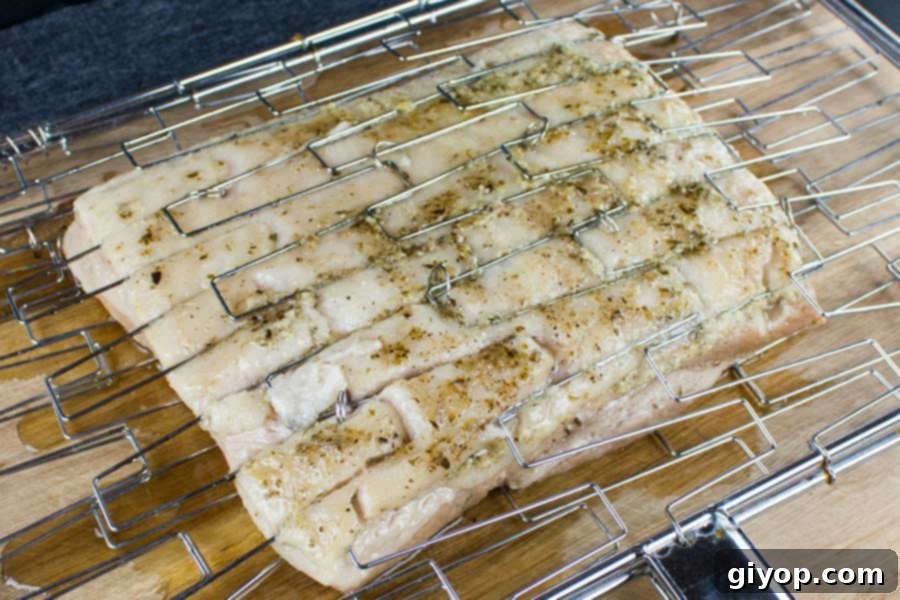 Step up your grill game by serving up some deliciously rendered down smoked pork belly. It's so rich and decadent, everybody will rave!