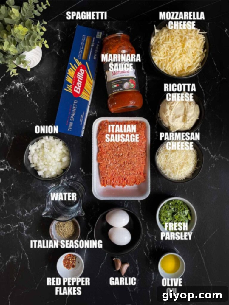 Ultimate Oven-Baked Spaghetti Delight 3 Baked spaghetti ingredients laid out on a dark surface, including spaghetti, Italian sausage, various cheeses, and fresh herbs.