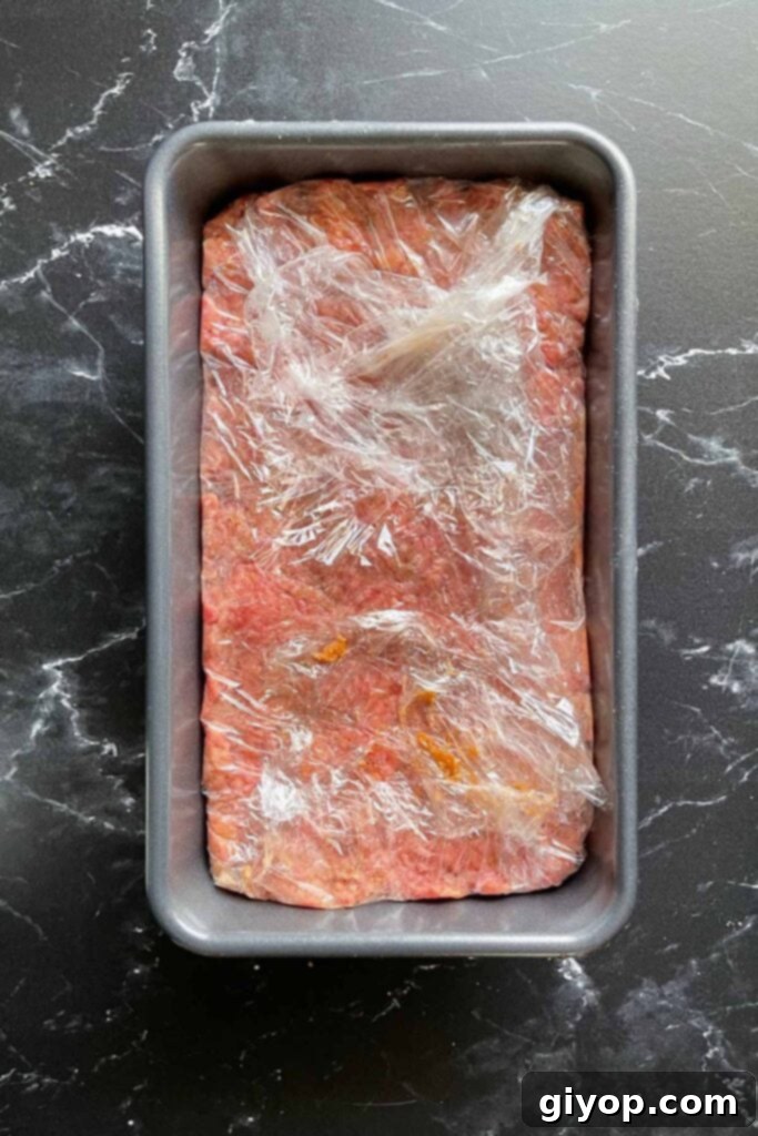 Slow-Smoked Meatloaf Masterpiece 7 uncooked meatloaf in a loaf pan