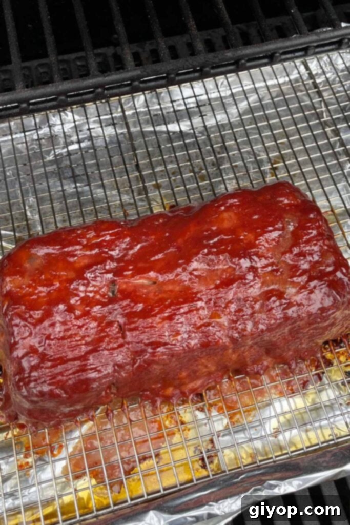 Slow-Smoked Meatloaf Masterpiece 10 smoked meatloaf in the smoker.