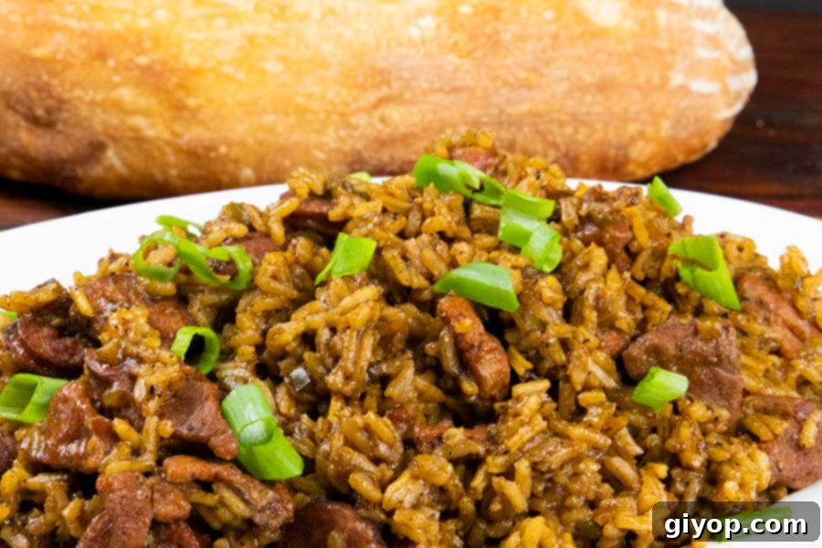 This authentic and amazingly delicious Cajun jambalaya recipe delivers that New Orleans flavor that brings Bourbon Street to you! #jambalaya #cajun #food #recipes