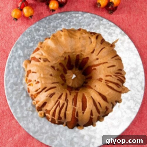 Cider-Glazed Apple Pound Cake 8 Apple cider pound cake on silver plate.