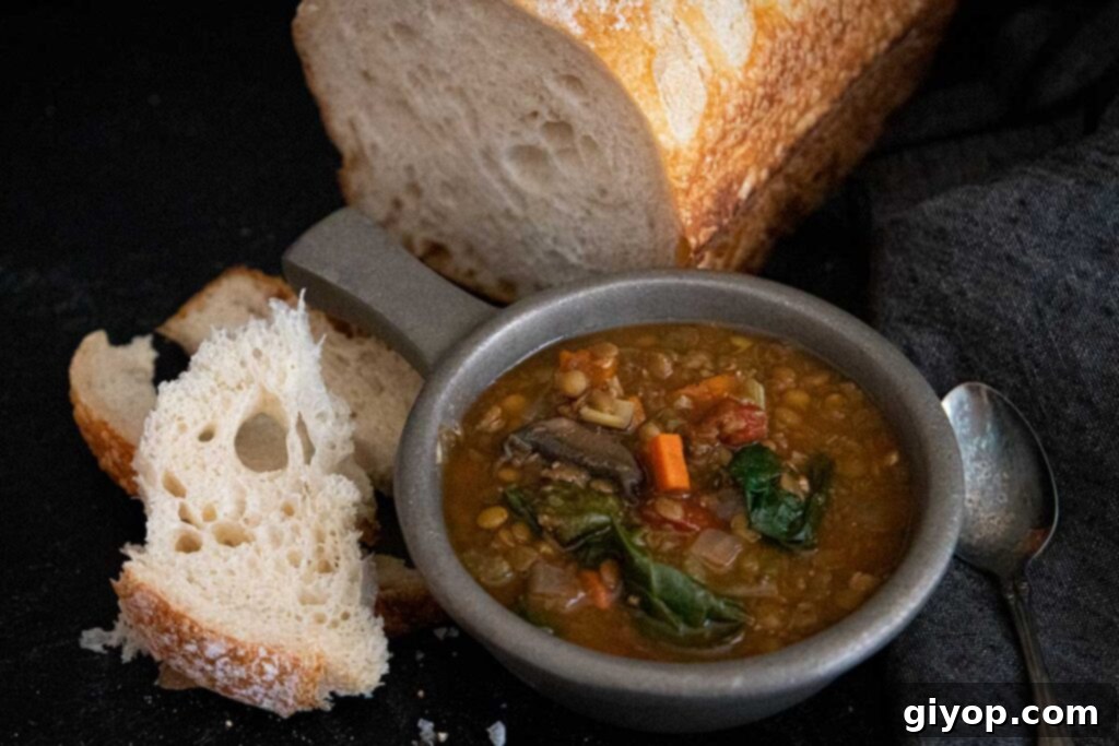 Lentil soup with bread.