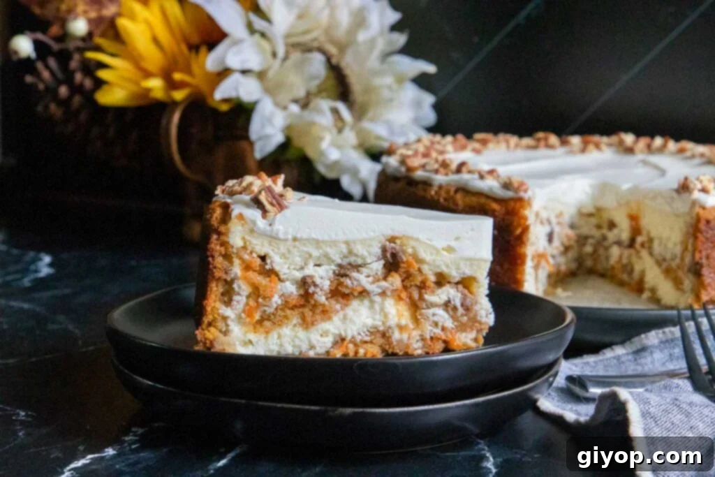 A slice of carrot cake cheesecake on black plate, showcasing distinct layers of spiced carrot cake and creamy cheesecake, topped with cream cheese frosting.