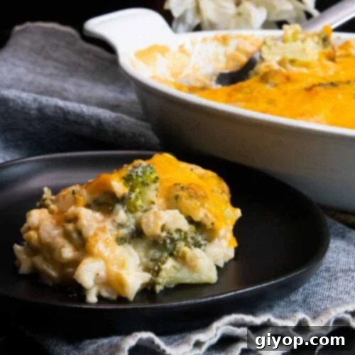 Broccoli rice casserole on black plate.