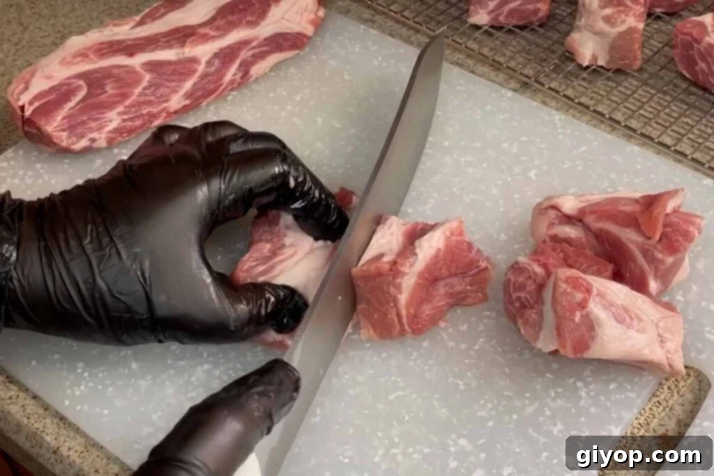 Ultimate Smoked Pork Burnt Ends 5 cutting pork butt into small pieces