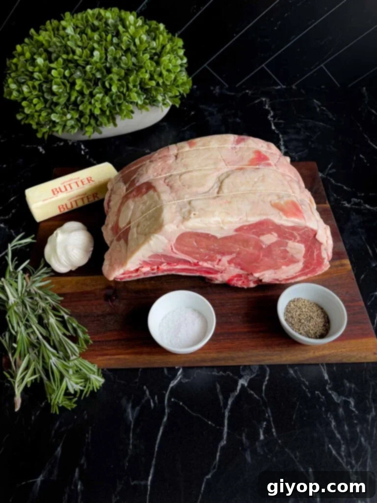 Ingredients for prime rib on a dark surface.