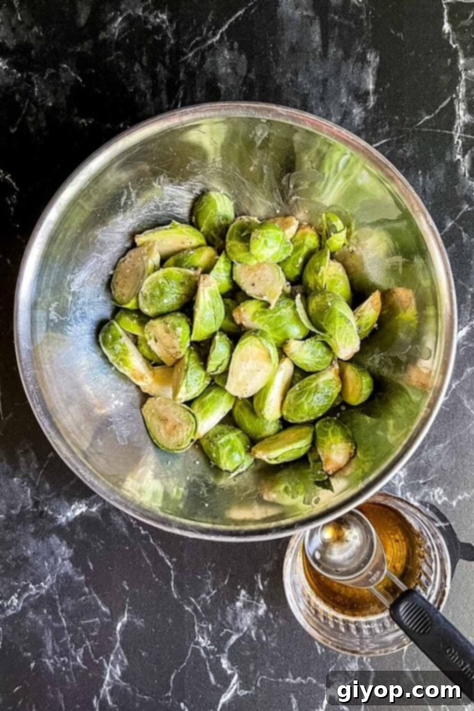 Raw brussels sprouts covered with bacon grease, salt and pepper.