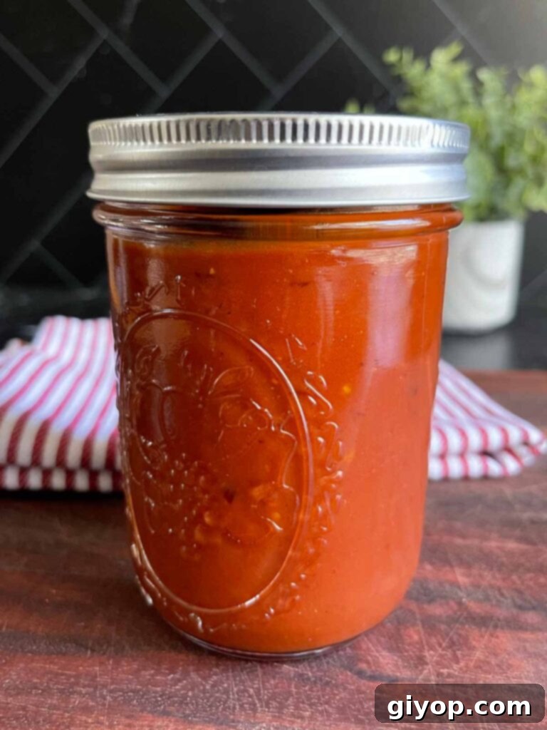 Homemade barbecue sauce in a mason jar.