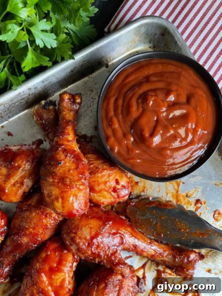 Homemade bourbon chipotle barbeque sauce on grilled chicken.