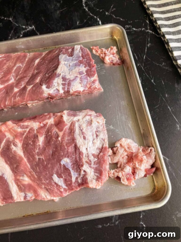 Two slabs of ribs after being meticulously trimmed of excess fat.