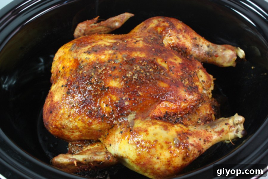 Slow Cooker Roasted Chicken served in a rustic dish.