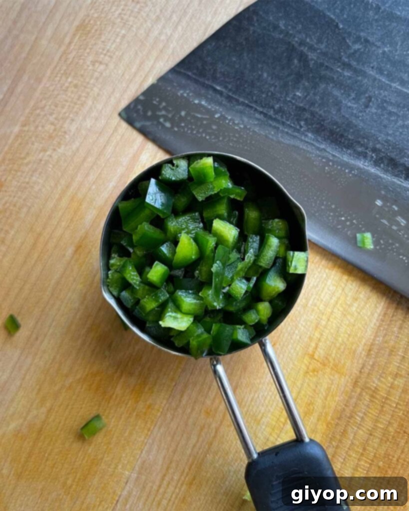 Pitmaster's Piggy Poppers 4 Jalapeños prepared for dicing.