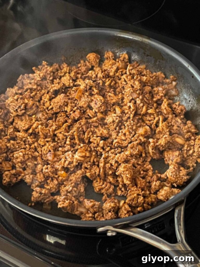Cheesy Chile Relleno Bake 9 Seasoned ground beef in a skillet.