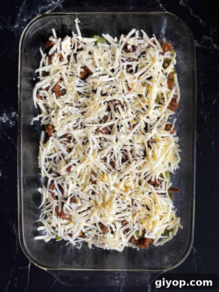 Cheesy Chile Relleno Bake 10 One layer of chile relleno casserole in glass baking dish.