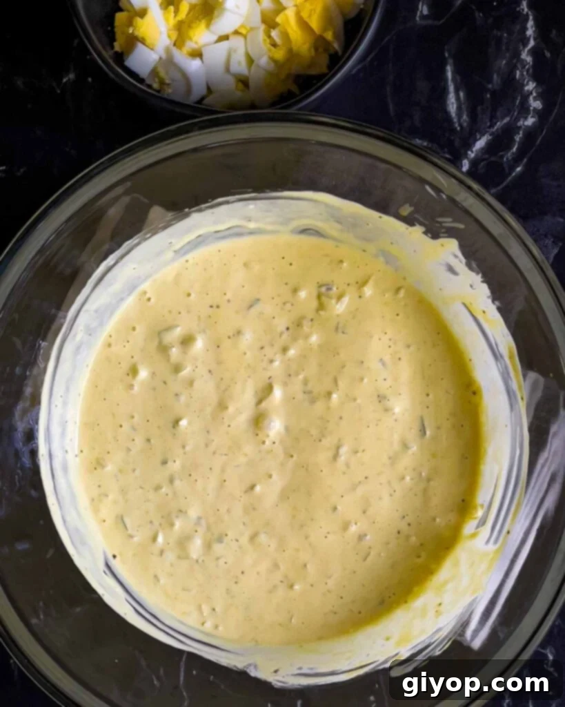 Homestyle Southern Potato Salad 6 Southern potato salad dressing combined in a large glass mixing bowl