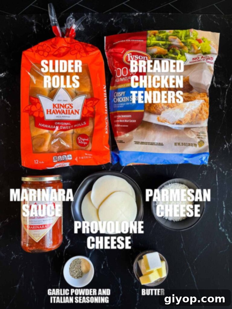 Cheesy Baked Chicken Parmesan Sliders 4 Individual ingredients for chicken parmesan sliders, including rolls, chicken, cheese, and sauce.