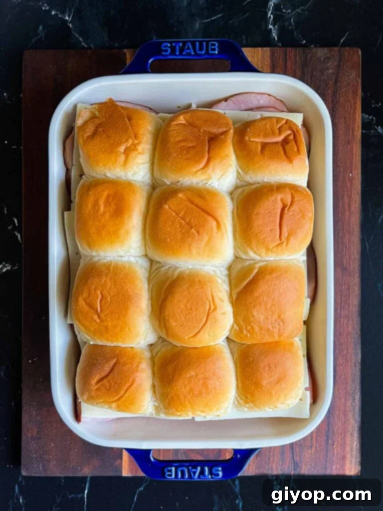 Monte Cristo sliders in a baking dish.