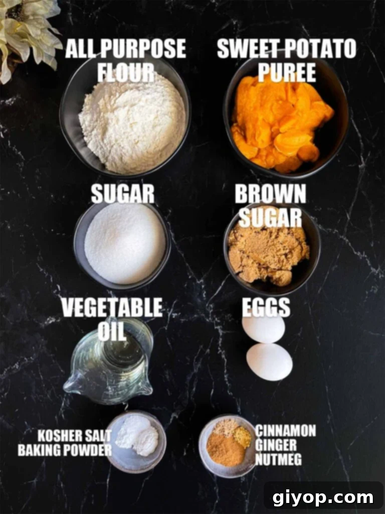 Sweet potato muffin recipe ingredients on a dark surface.