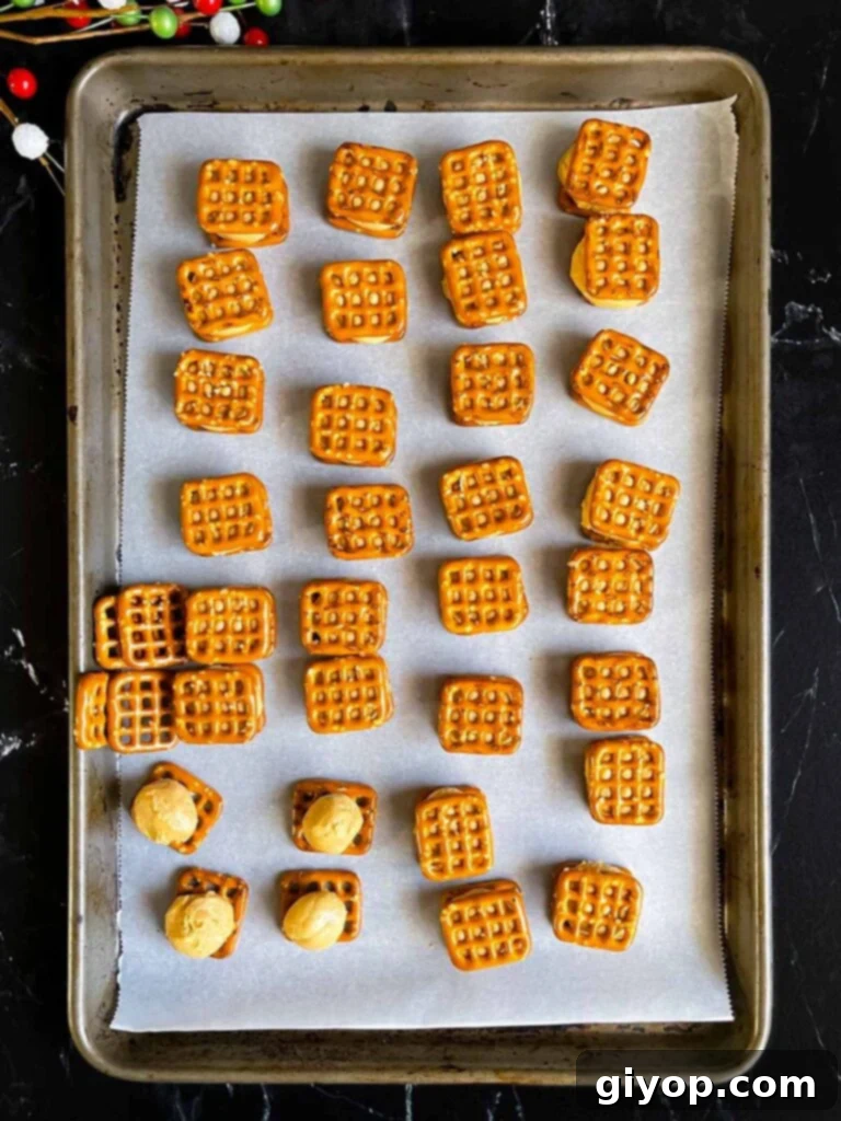 Salty Sweet Peanut Butter Pretzel Treats 6 Peanut butter mixture rolled into balls and placed on the pretzels on prepared baking sheet.