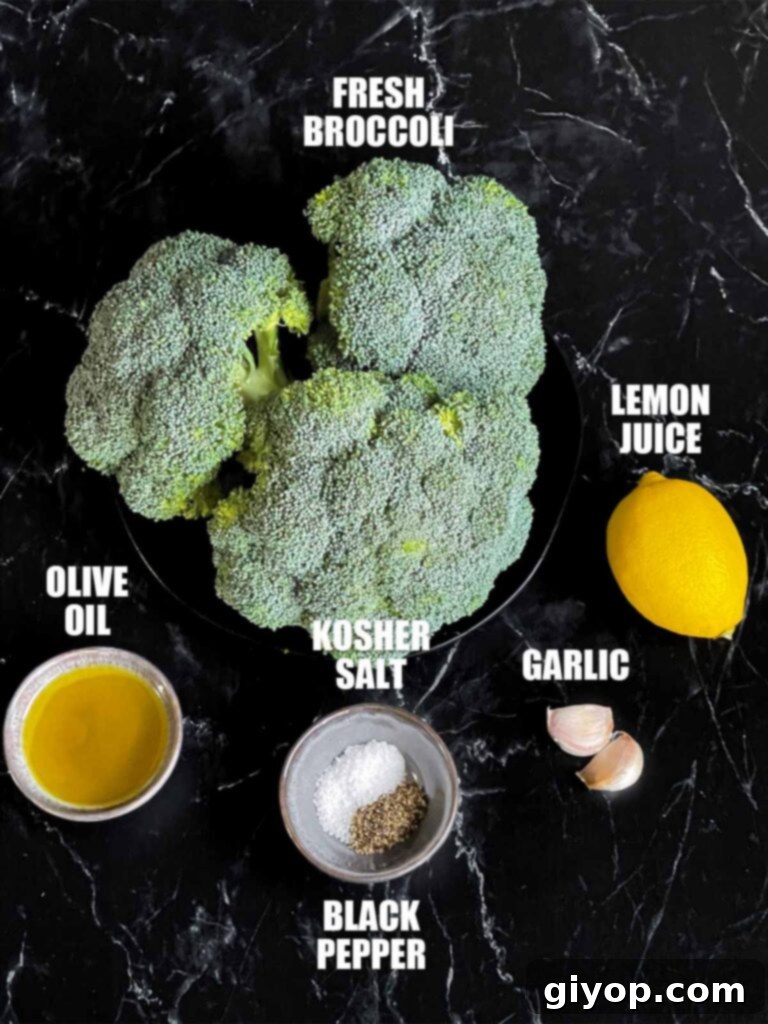 Crispy Roasted Broccoli 3 Fresh broccoli florets, olive oil, minced garlic, kosher salt, and black pepper laid out as ingredients for roasted broccoli.