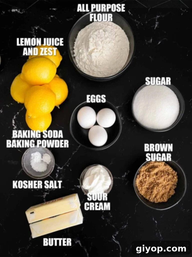 Lemon crumb cake recipe ingredients on a dark surface.