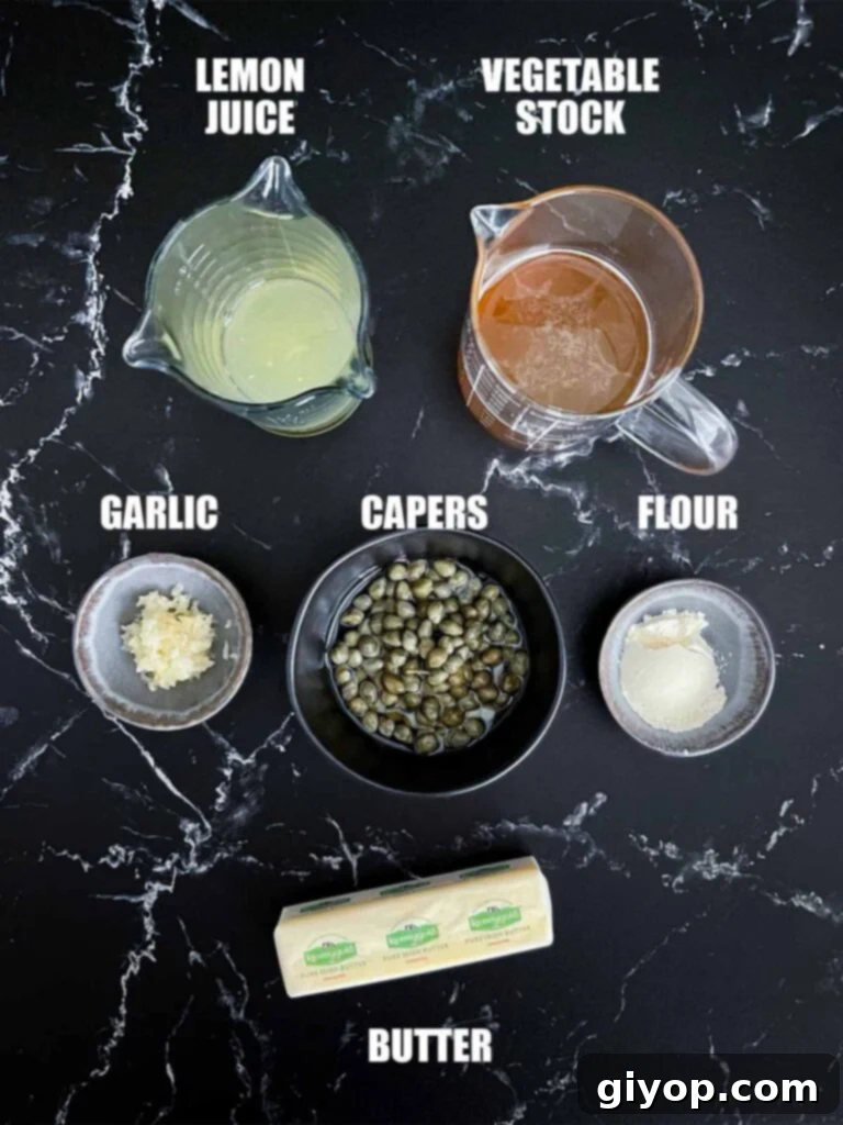 Key ingredients for a zesty lemon caper piccata sauce, including butter, lemon, and capers.