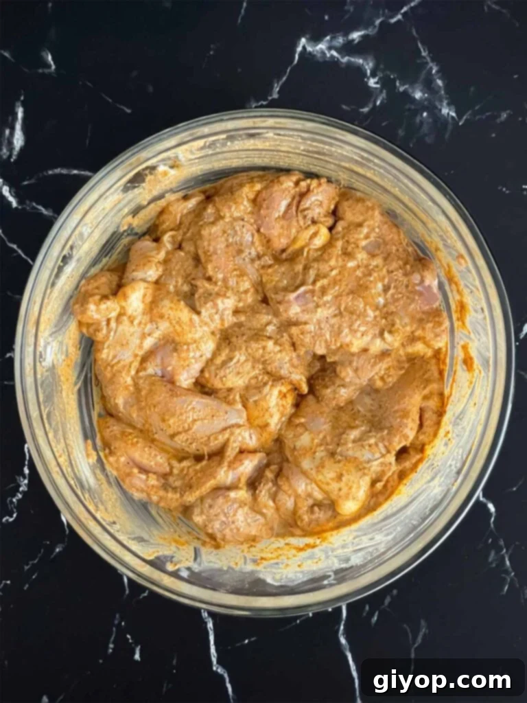 Chicken thighs in a shawarma marinade.