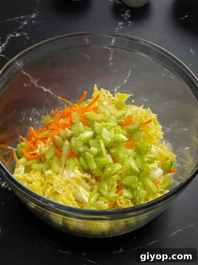 Freshly chopped cabbage, celery, and matchstick carrots for the ancho slaw.