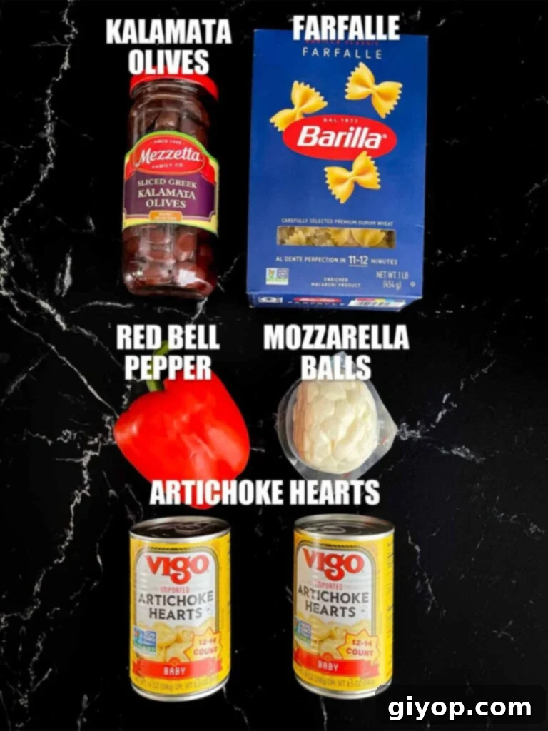 Zesty Mediterranean Pasta with Garden Herb Dressing 4 Prepped Mediterranean pasta salad ingredients including cooked farfalle, sliced Kalamata olives, diced red bell pepper, and pearl mozzarella balls.