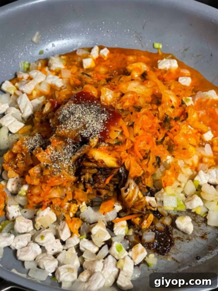 A kimchi mixture in a skillet.