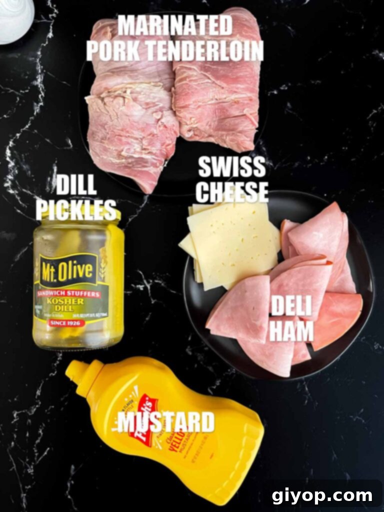 Grilled Mojo Pork Roulade 4 Deli ham and Swiss cheese, ready to stuff into the Cuban pork tenderloin.