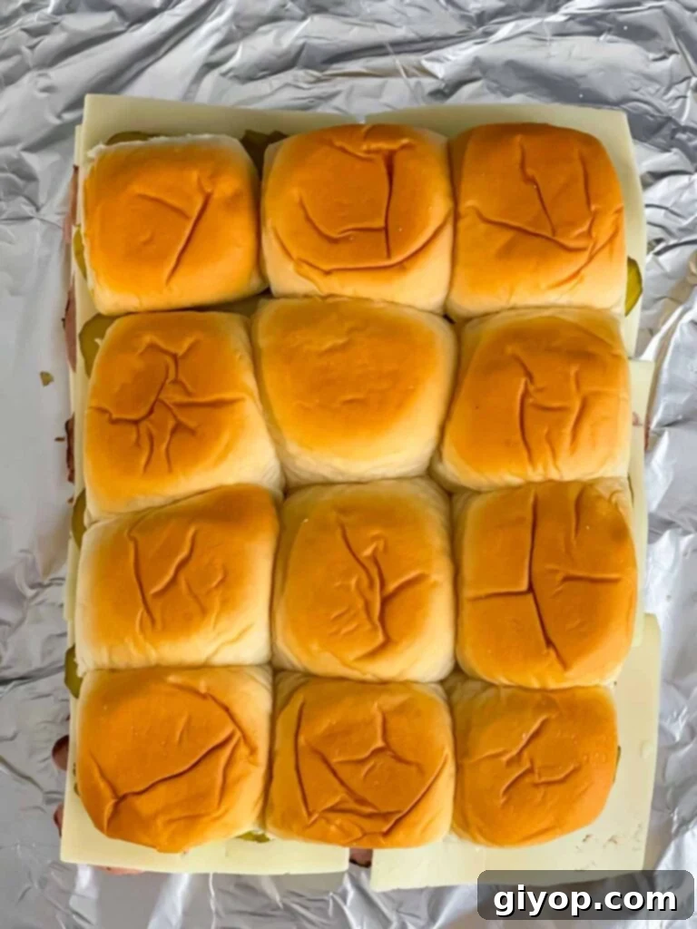 Cuban sliders assembled and ready to be baked in the oven.