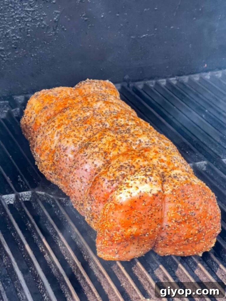 Texan Pit Smoked Pork Loin 5 A pork loin on a smoker.