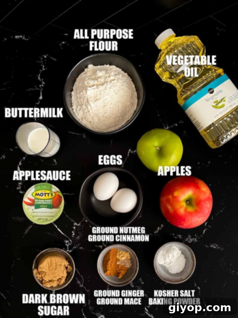 Cinnamon Apple Bliss 3 Apple fritters recipe ingredients on a dark surface.