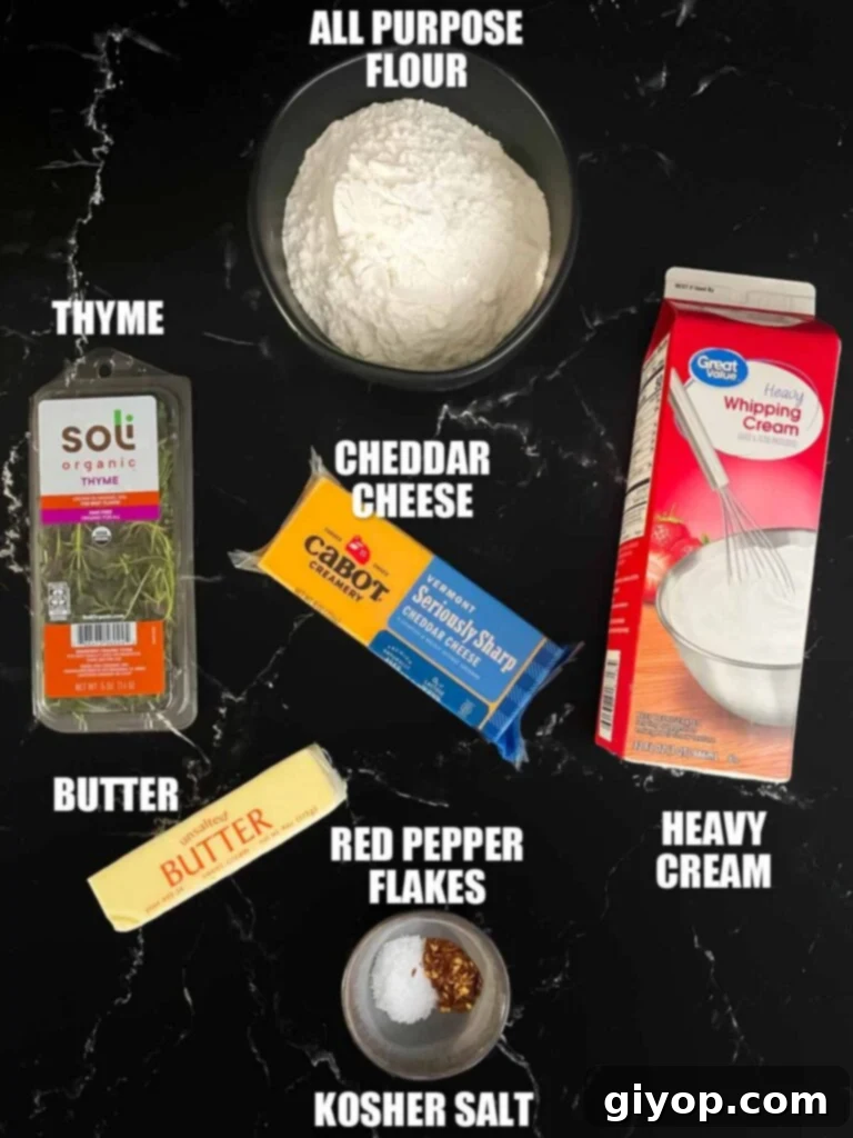 Savory Cheddar Herb Twists 3 All the fresh and pantry ingredients laid out to prepare delicious homemade cheddar cheese and herb straws.