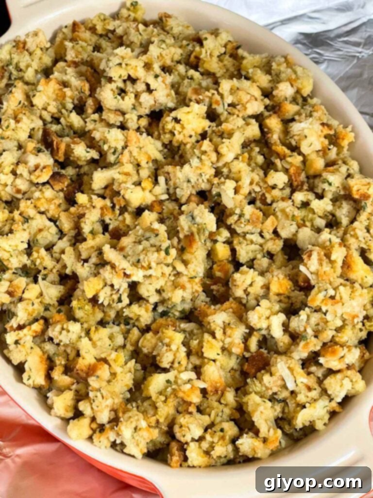 Unbaked Chicken Stuffing Casserole in a baking dish, topped with stuffing.