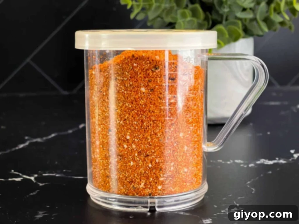 Kansas City Style BBQ Rub 2 Kansas City Style Barbecue Rub in a shaker.