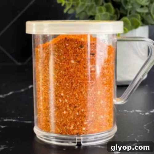 Kansas City Style BBQ Rub 6 Kansas City Style Barbecue Rub in a shaker.