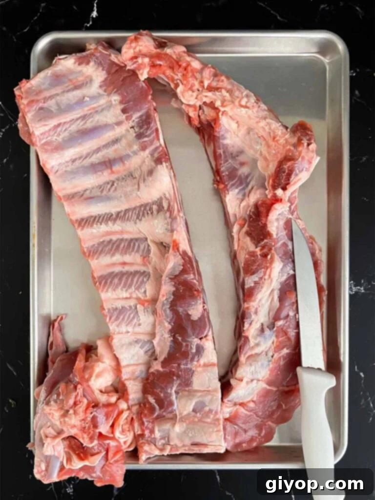 A rack of spare ribs perfectly trimmed to St. Louis style.