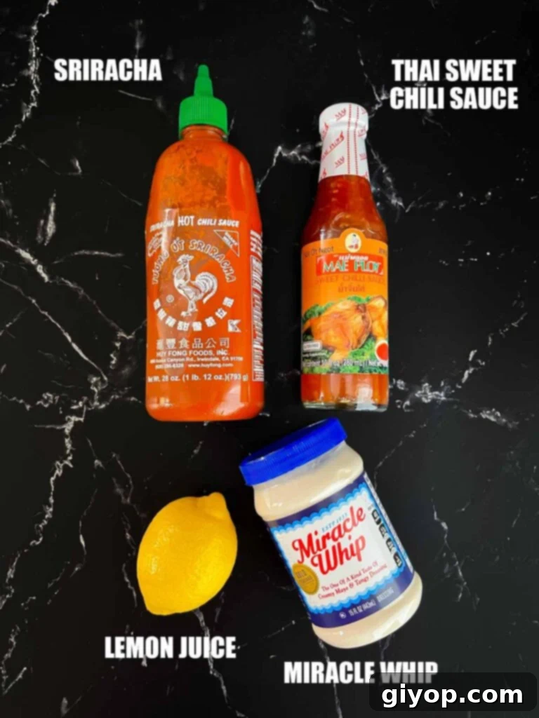 Individual bowls of Miracle Whip, Thai sweet chili sauce, lemon juice, and sriracha, ready to be combined for Bang Bang Sauce.