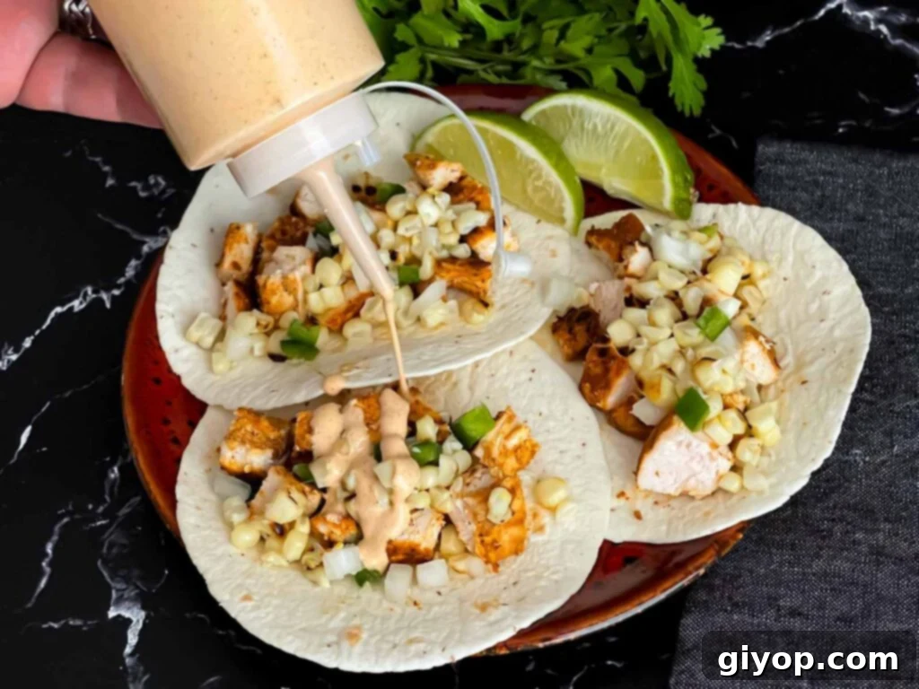 Grilled chicken tacos drizzled generously with a rich, creamy southwest sauce.