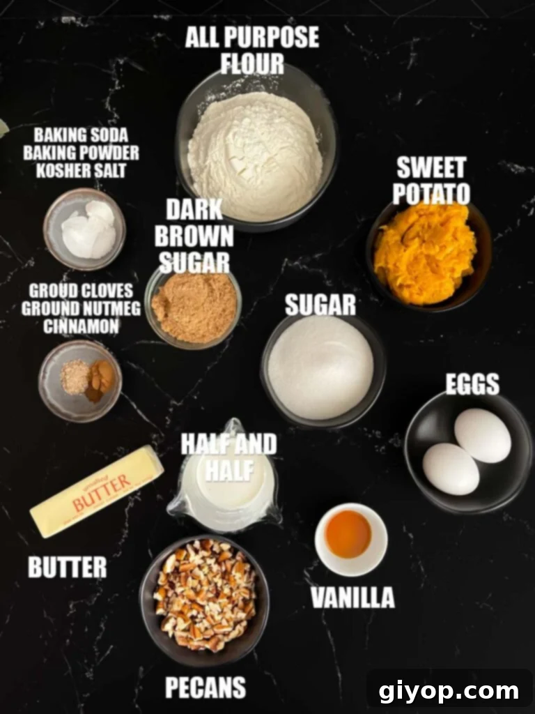 Sweet potato bread recipe ingredients on a dark surface, including spices, sugars, and mashed sweet potato.