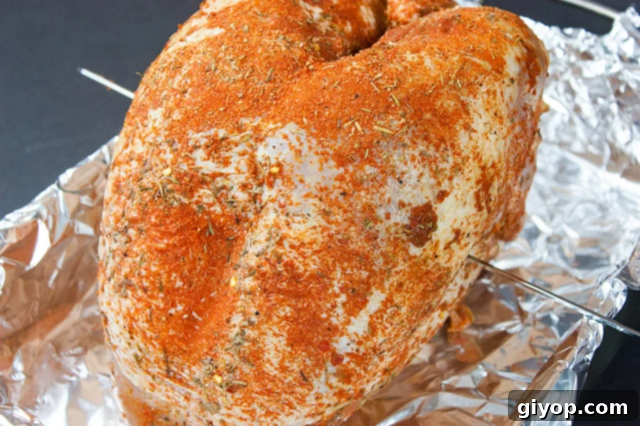 Artisan Cajun Turkey Deli Slices 4 Homemade Cajun Turkey Deli Meat - turkey breast on a foil lined roasting pan