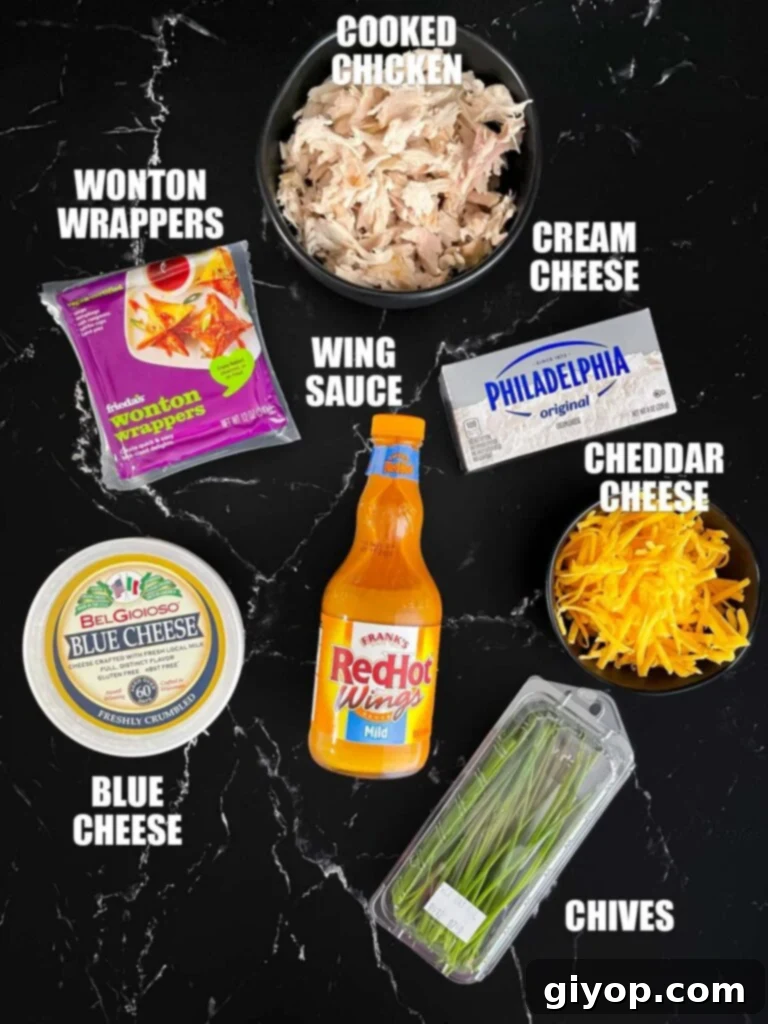 Ingredients needed for buffalo chicken wonton cups laid out on a wooden board.