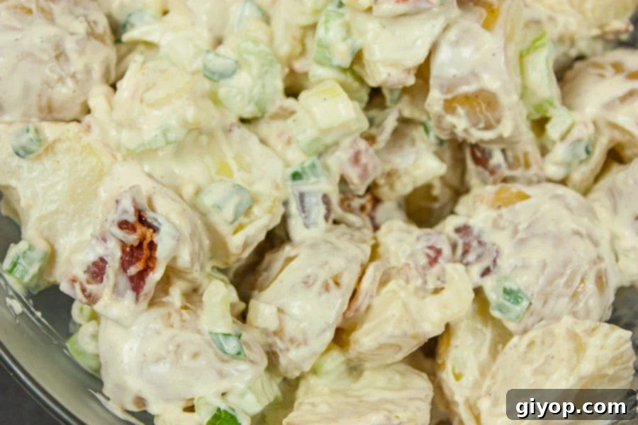 Effortless Bacon Potato Salad 6 Easy Bacon Potato Salad in a large glass bowl.