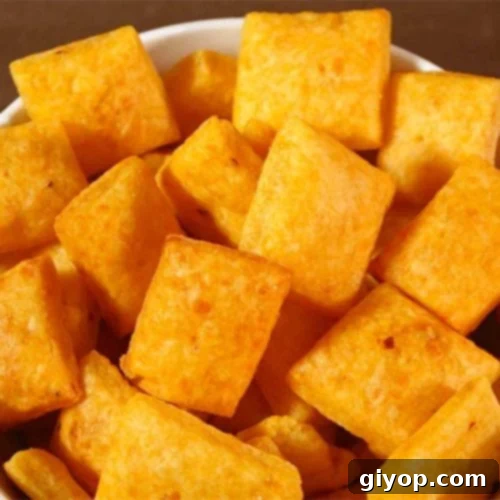 Spicy Cheese Crackers in a white bowl.