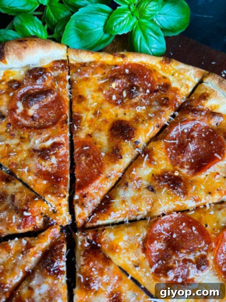 Homemade pepperoni pizza using homemade pizza dough.