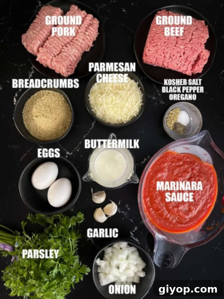 Baked parmesan meatballs recipe ingredients on a dark surface.